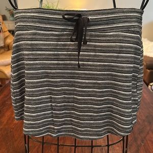 SALE!!Like New! Smartwool, black and white skirt. Drawstring and longer in back.